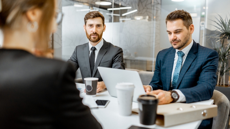 Business men on a conference in the meeting room